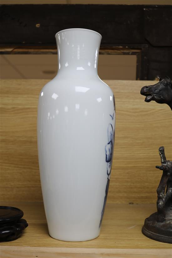 A Chinese blue and white vase, Mao Tse Tsung poem 1966 hidden within the body of the vase, wood stand height 37cm